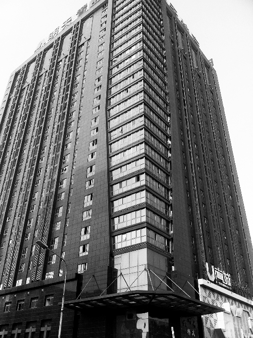 記者按照公開地址在鄭州一處寫字樓尋找一家軟件公司，一無所獲。