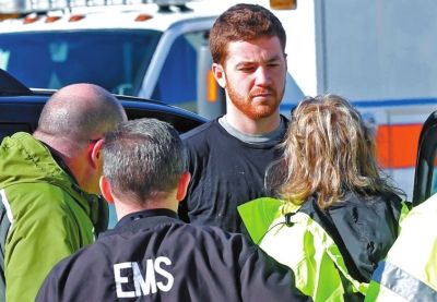 嫌犯接受詢問。新華社/美聯(lián)