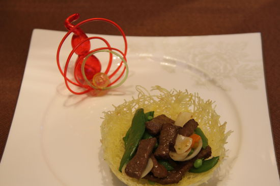 雀巢爆羊柳。 花惠生 供圖