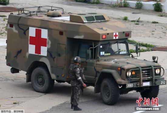 資料圖：當(dāng)?shù)貢r間2014年6月23日，韓國江原道哨所槍擊事件肇事士兵林某已被抓獲