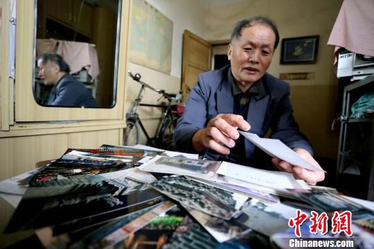 鄭州老人六年騎行五萬(wàn)里 尋拍古建筑 鄭州老人六年騎行五萬(wàn)里 尋拍古建筑